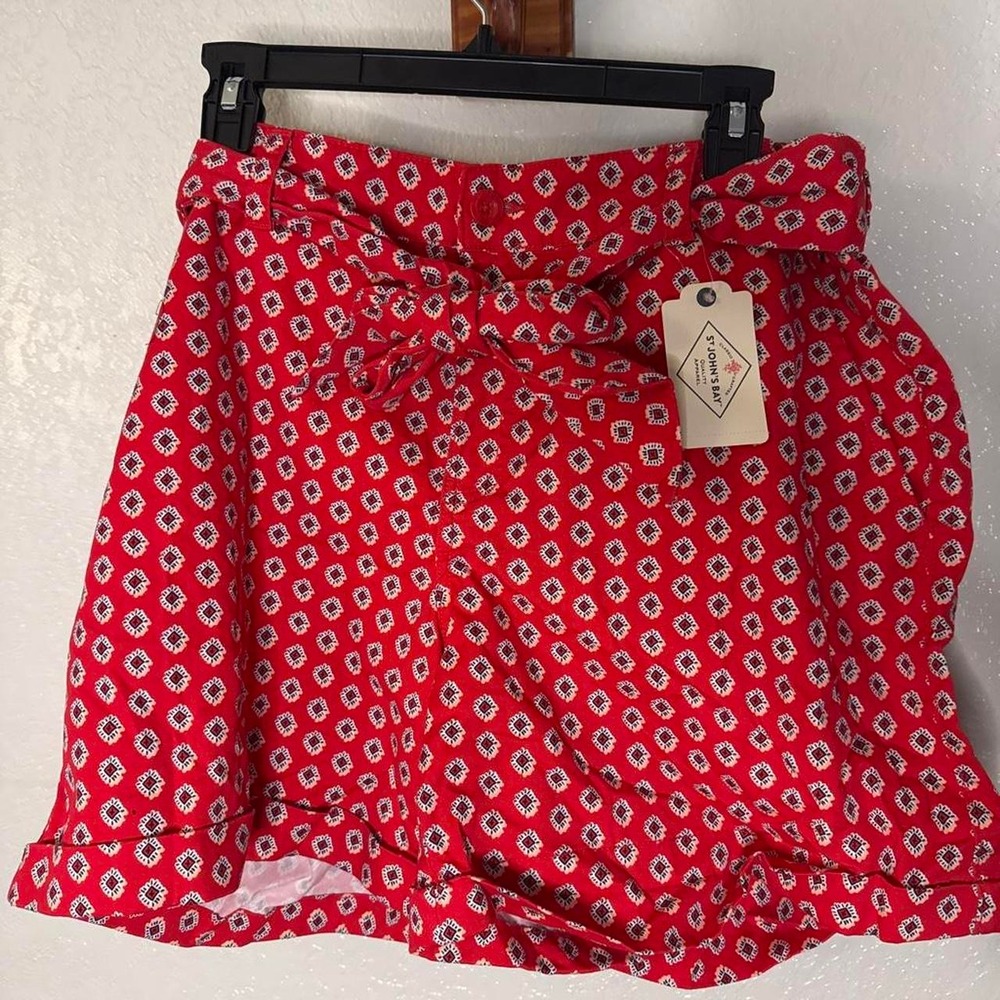 Red shorts with white and black geometric diamond pattern